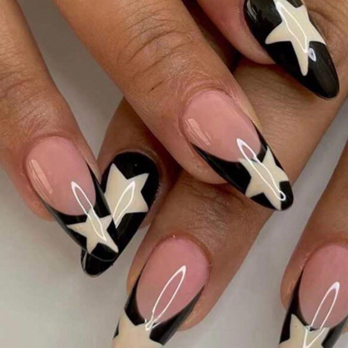 24 Pieces Medium Length Almond Nails Black French Cream White Stars Full Coverage False Nails for Ladies and Girls